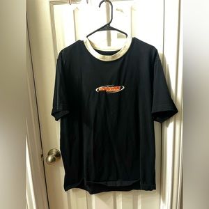 black short sleeve welcome t-shirt with white neckline and embroidered logo